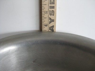 large bowl measures 12 inches across, about 3 inches deep and holds 10 