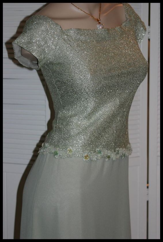 Details Beautiful long formal gown, top has metallic fiber added and 