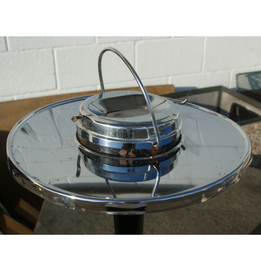   finish polished chrome construction flip top with inside container for