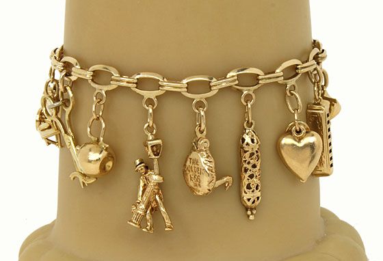 VINTAGE 14K SOLD GOLD CHARM BRACELET W/ 12 CHARMS  