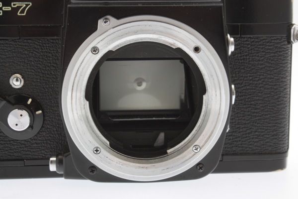 Included   Camera   Minolta Body Cap   Manual