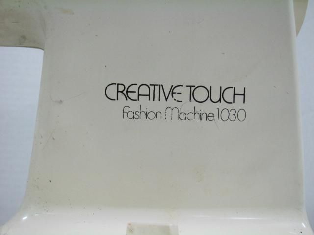   used Singer Creative Touch Fashion Sewing Machine 1030 with cover