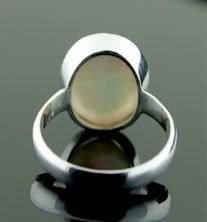 this is a sweet mother of pearl ring with a faceted quartz top this 