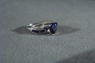   10 K WHITE GOLD 11 LAB CREATED BLUE SAPPHIRE 12 DIAMOND BRIDGE RING 7